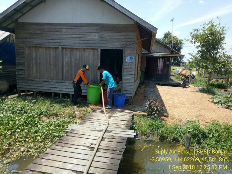 Pendistribusian Air Bersih Desa Kampung Baru Kecamatan Beruntung Baru